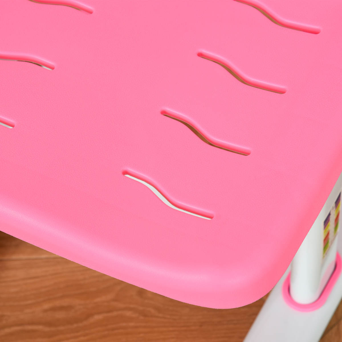 Pink kids study desk and chair set by HOMCOM, featuring adjustable height and a storage drawer for organization.