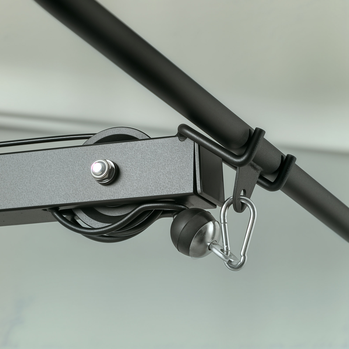 Exercise pulldown machine Power Tower with adjustable seat and cables, showcasing a sturdy design and ergonomic features.