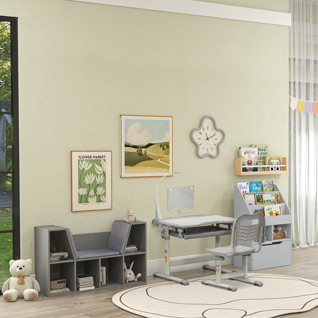Kids study desk and chair set in grey with adjustable height and USB lamp, designed by HOMCOM for comfortable learning.