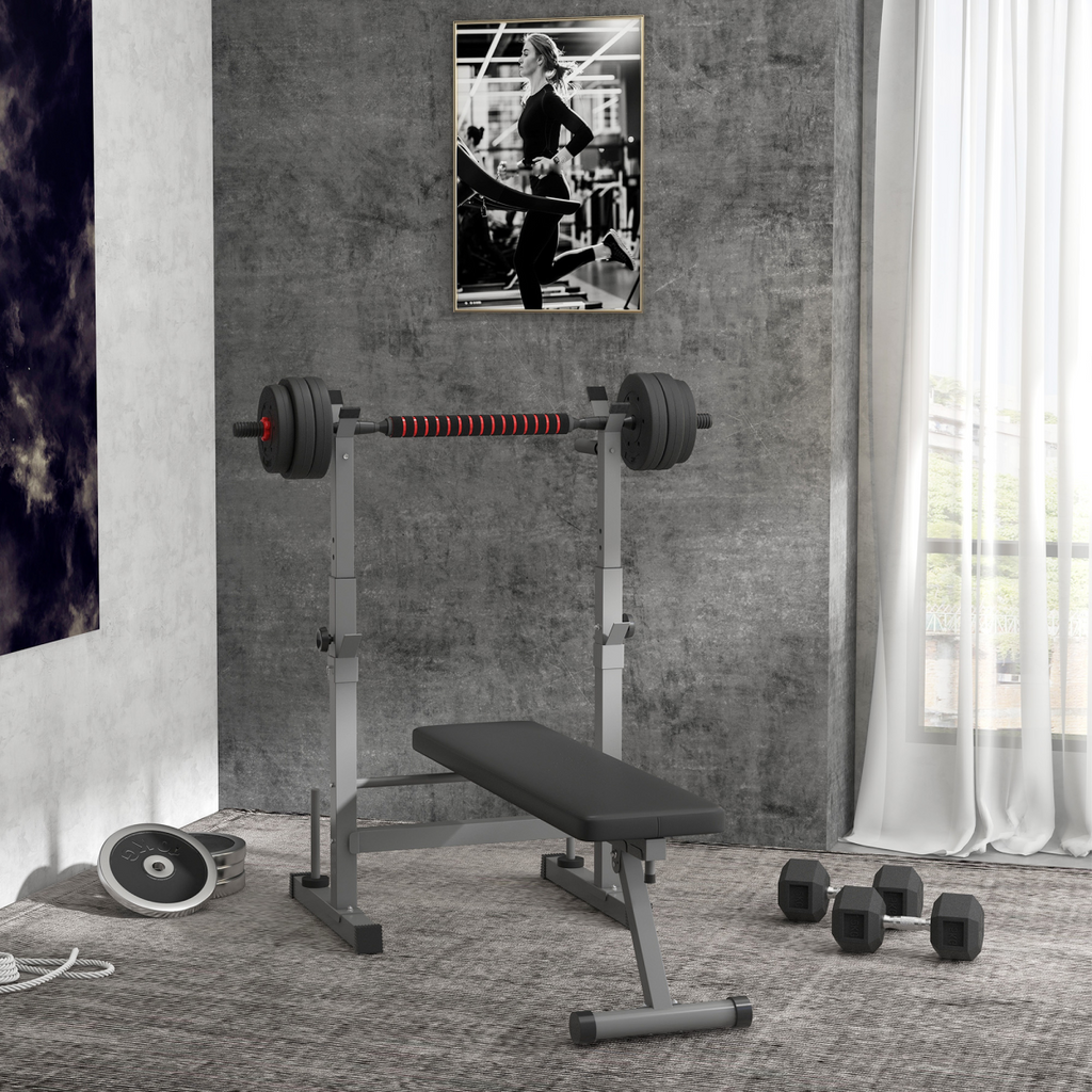 Adjustable foldable weight bench with barbell rack and dip station by ActiveGear, showcasing sturdy design and versatility.