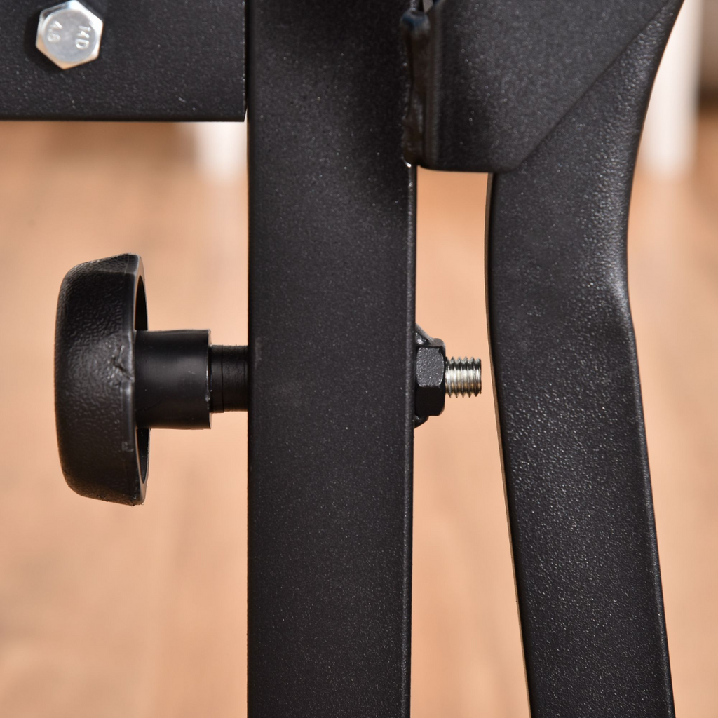 Adjustable ActiveGear weight bench with leg developer and barbell rack for home gym workouts.