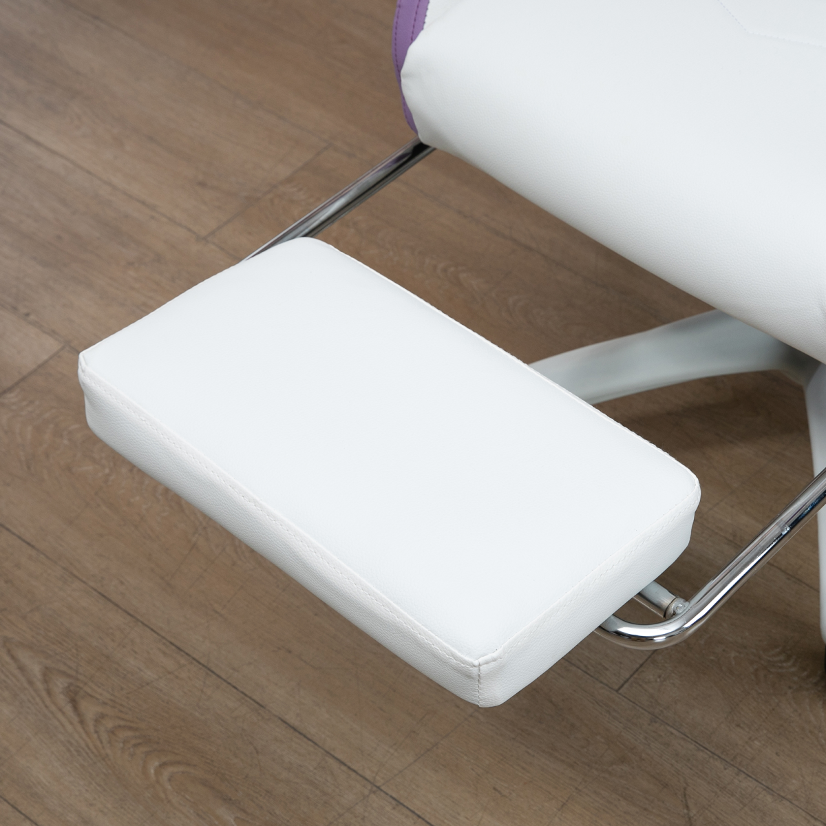 Vinsetto purple racing style gaming chair with faux leather, reclining feature, and footrest for comfortable seating.