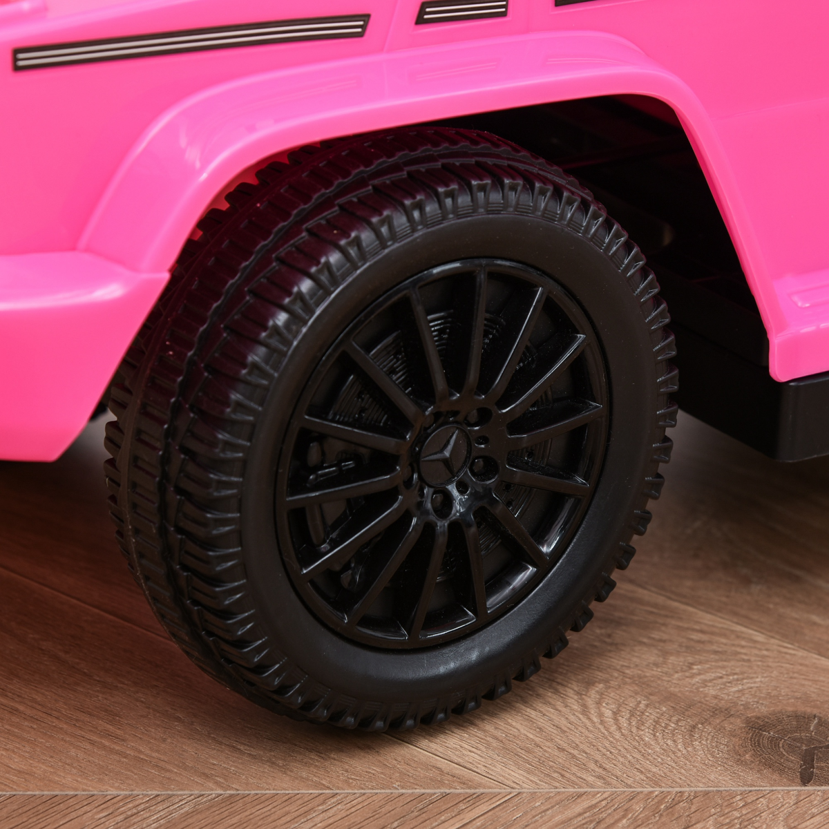 Licensed pink Mercedes Benz G350 ride-on push car with sun canopy for toddlers aged 12-36 months by FunZone.