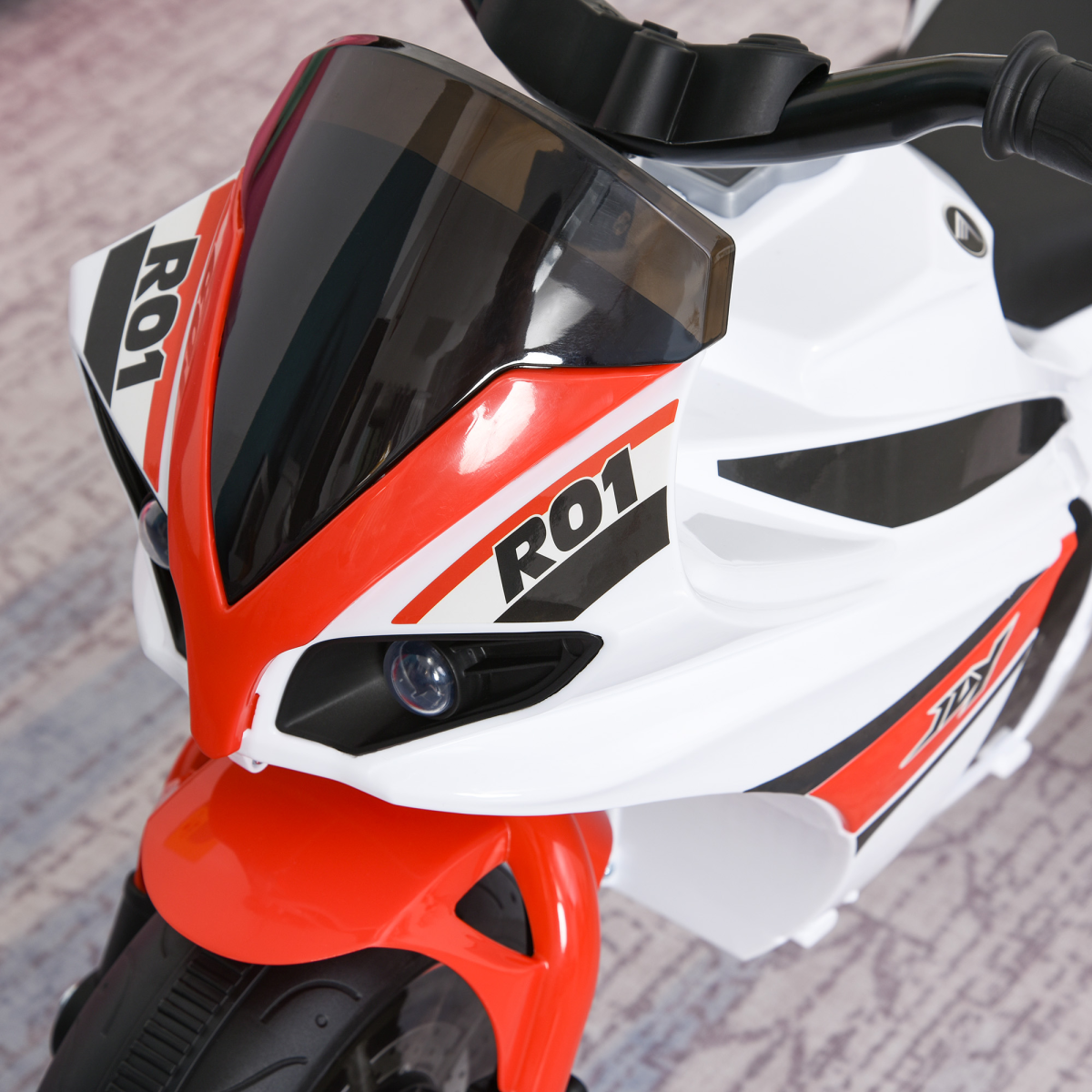 Kids ride-on police bike with three wheels, music, and lights for ages 18-36 months by FunZone.