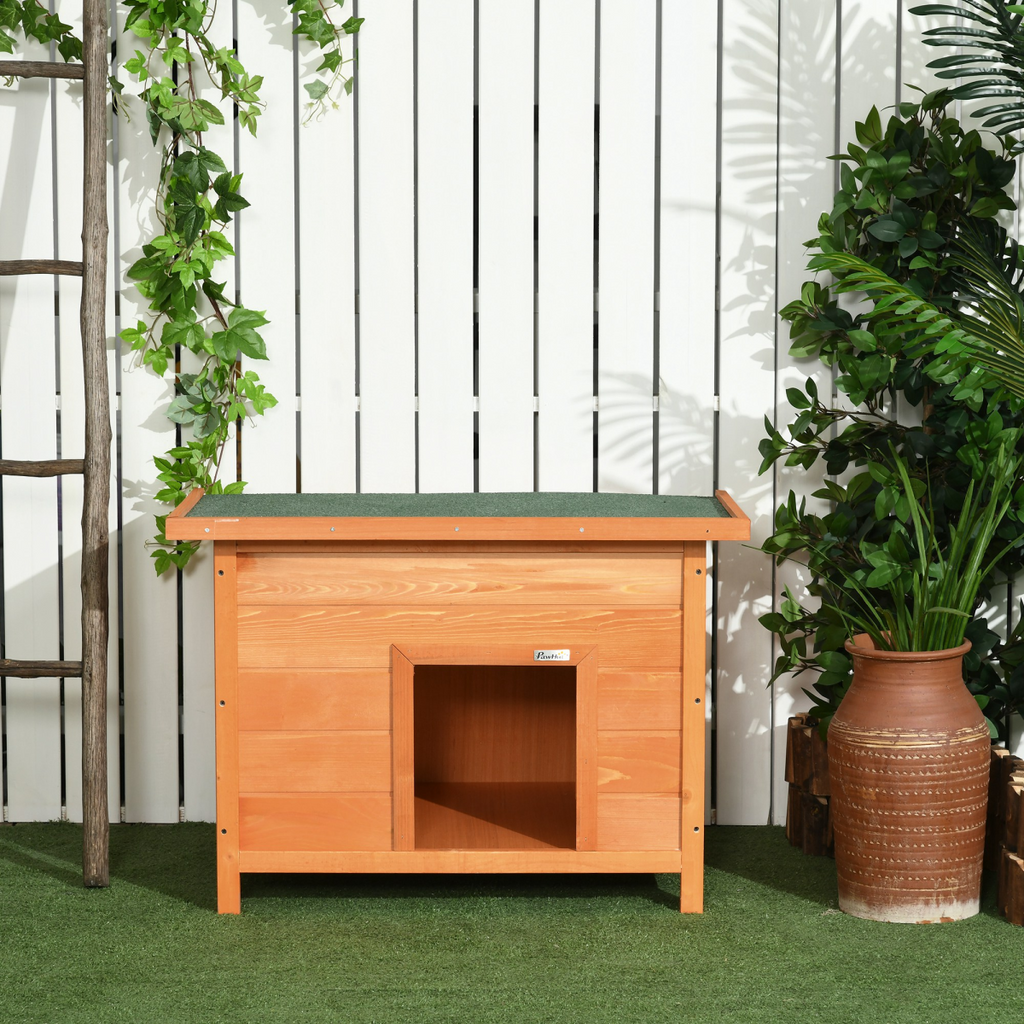82cm Pawhut wooden dog kennel featuring a waterproof design and elevated floor for outdoor pet comfort.