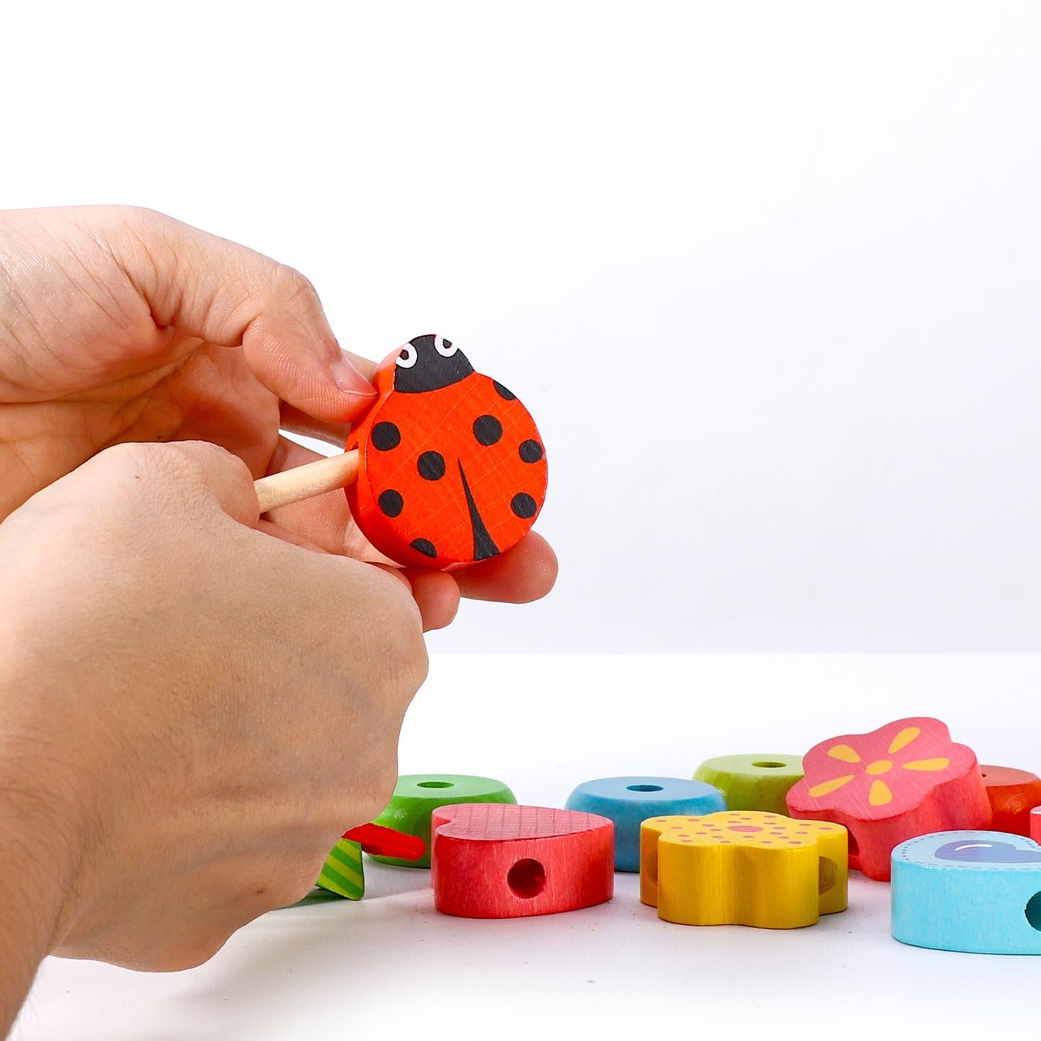 SOKA First Threading toy from FunZone, featuring colorful threads and beads for creative play and learning.