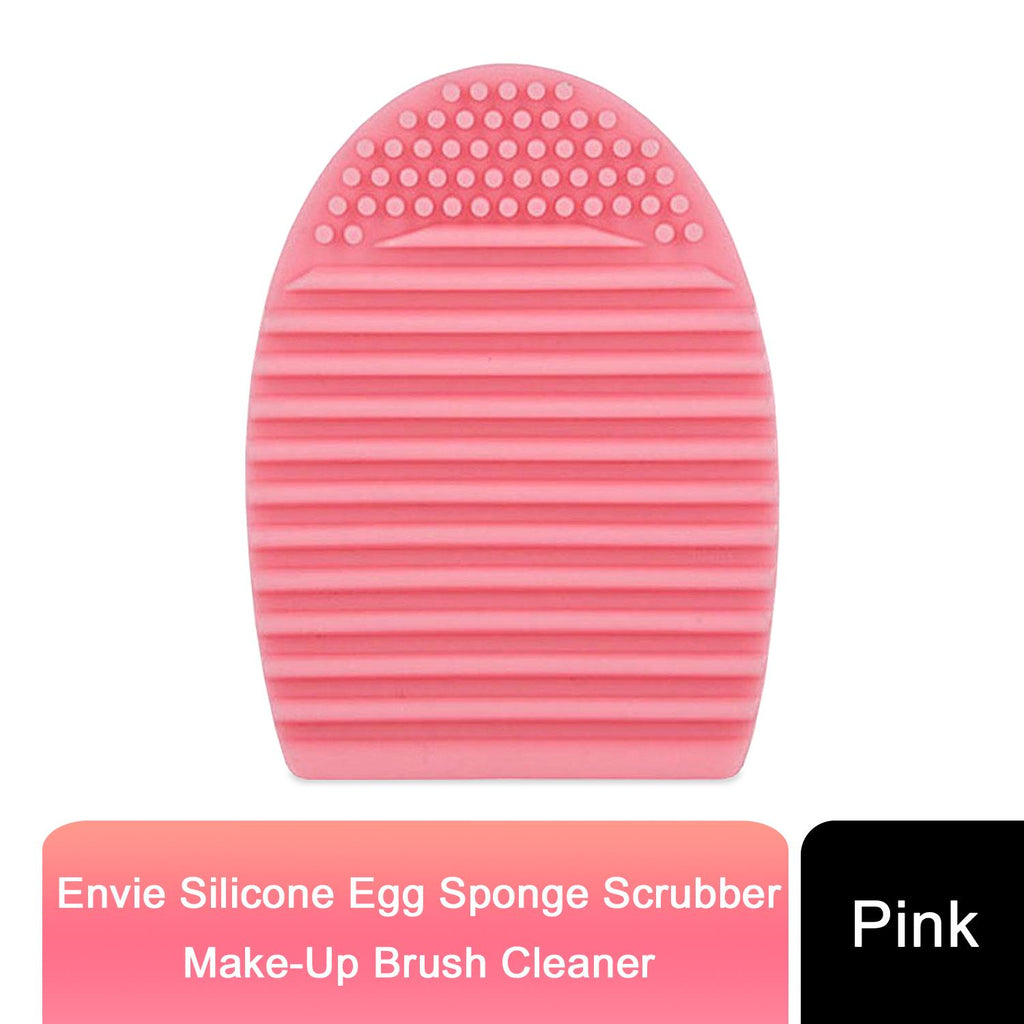Pink and purple Silicone Egg Sponge Scrubber by GlowCare for cleaning make-up brushes.