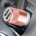 Rose gold FX TechHub car charger with twin USB sockets and fast charging capability.