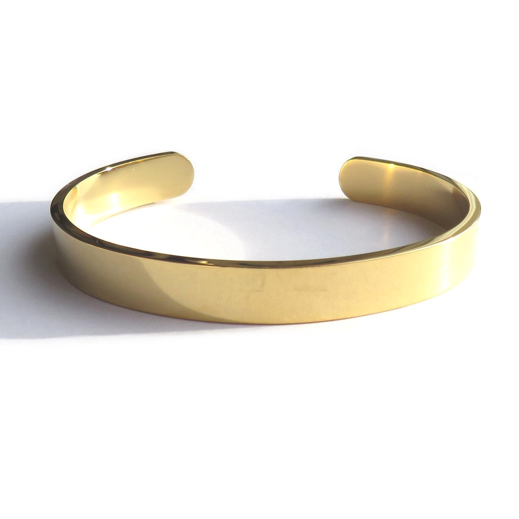 Unisex stainless steel gold bangle by LuxeTime, featured in a 14cm length, showcasing a sleek and modern design.