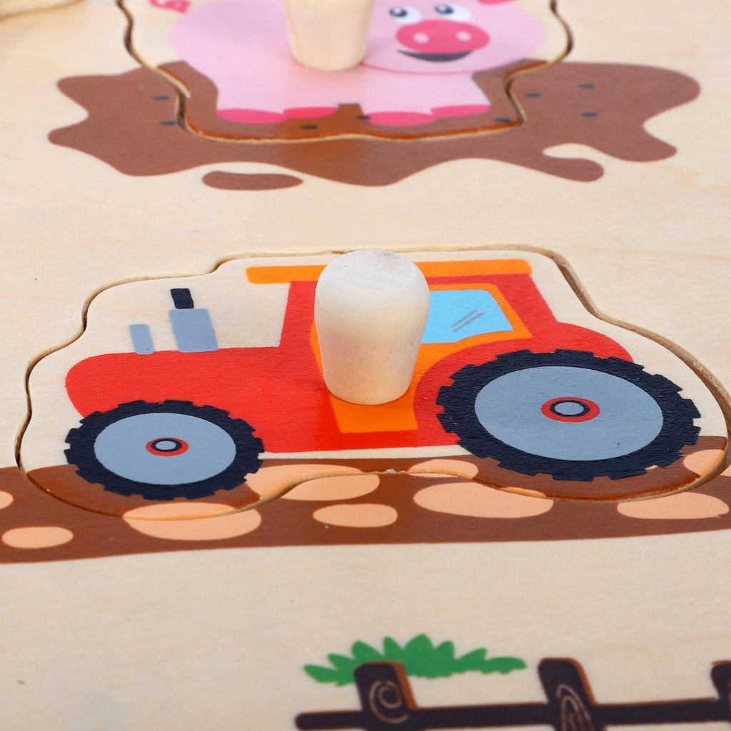 Colorful SOKA Farm Peg Puzzle from SOKA Play Imagine Learn featuring animal shapes and easy-to-grasp pegs for kids.