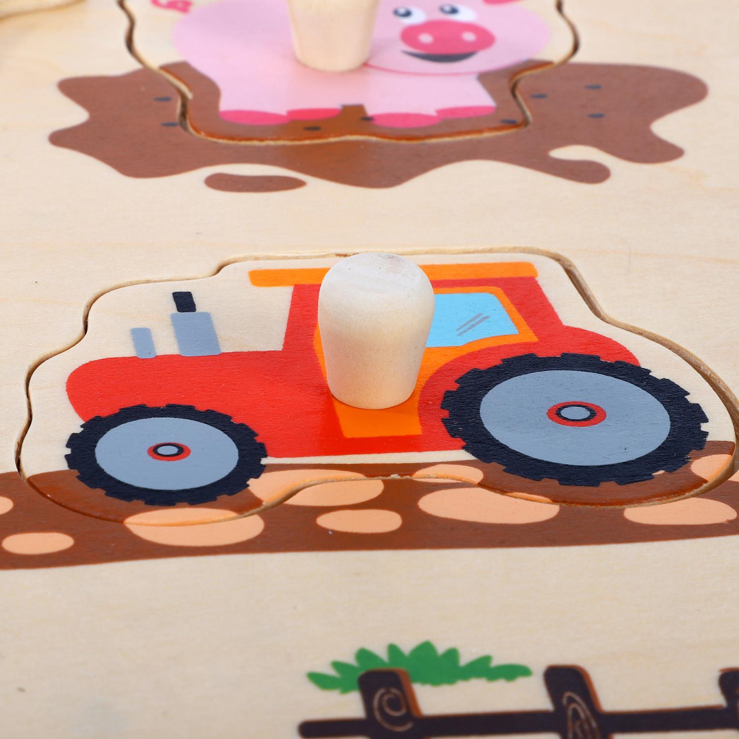 Colorful SOKA Farm Peg Puzzle from SOKA Play Imagine Learn featuring animal shapes and easy-to-grasp pegs for kids.