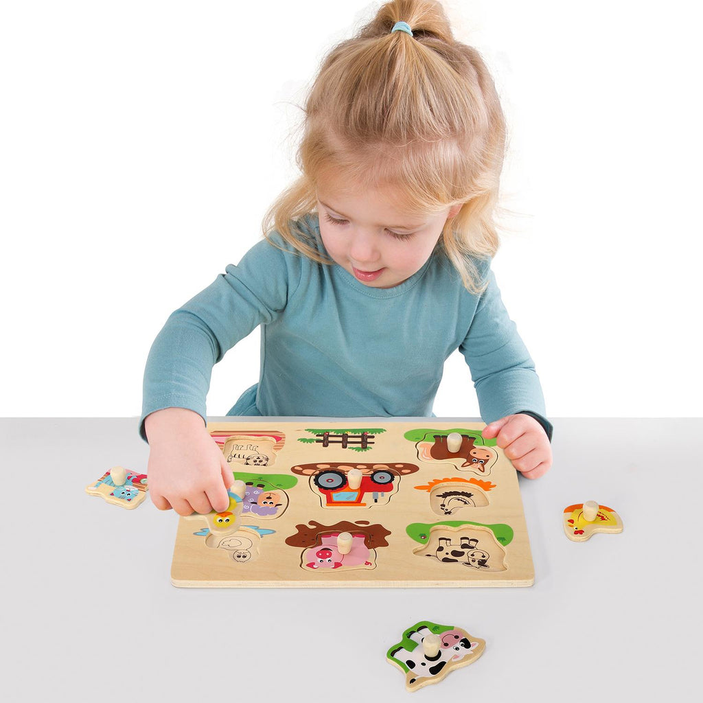 SOKA Farm Peg Puzzle featuring colorful animal shapes and easy-to-hold pegs for young learners from SOKA Play Imagine Learn.