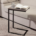 Black C-shaped side table with steel frame and powder coating, showcasing a 25kg capacity for versatile home use.