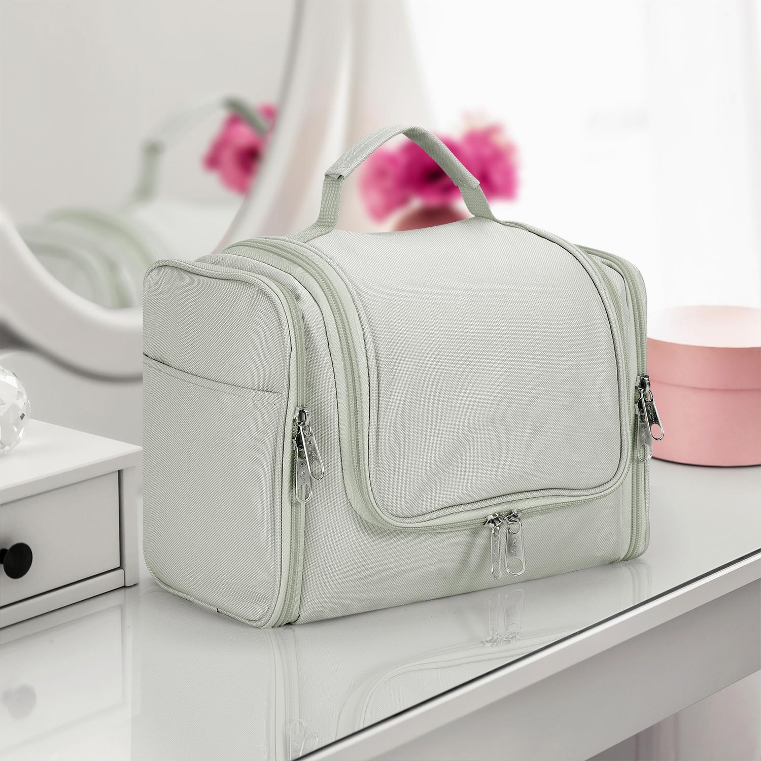 Light grey Vinsani HomeCraft toiletry bag, a hanging travel organizer with hook, showcasing waterproof material and compartments.