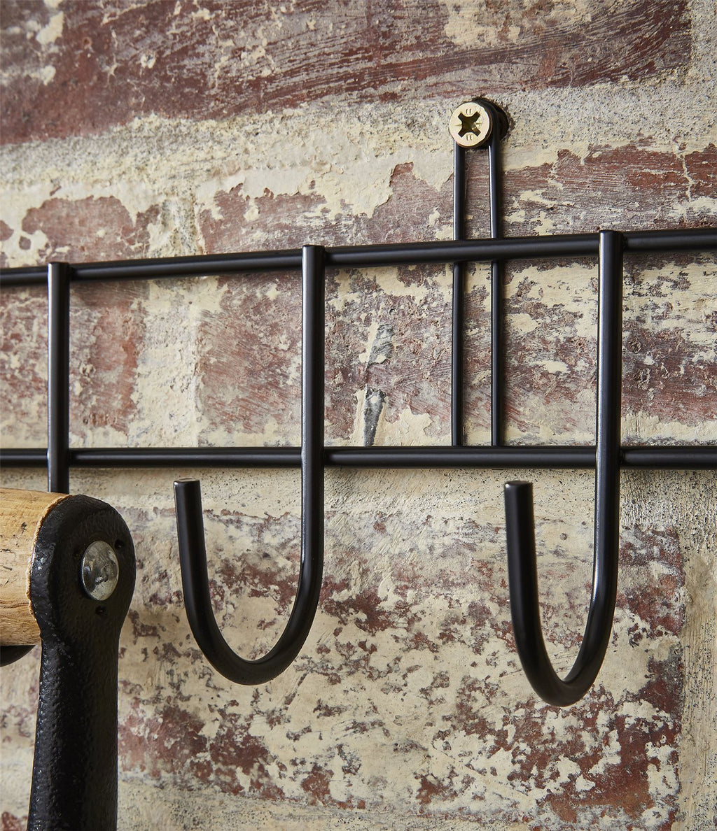 Extra-long HomeCraft tool rack with 16 hooks, featuring a black powder coating, measuring 102cm in length.
