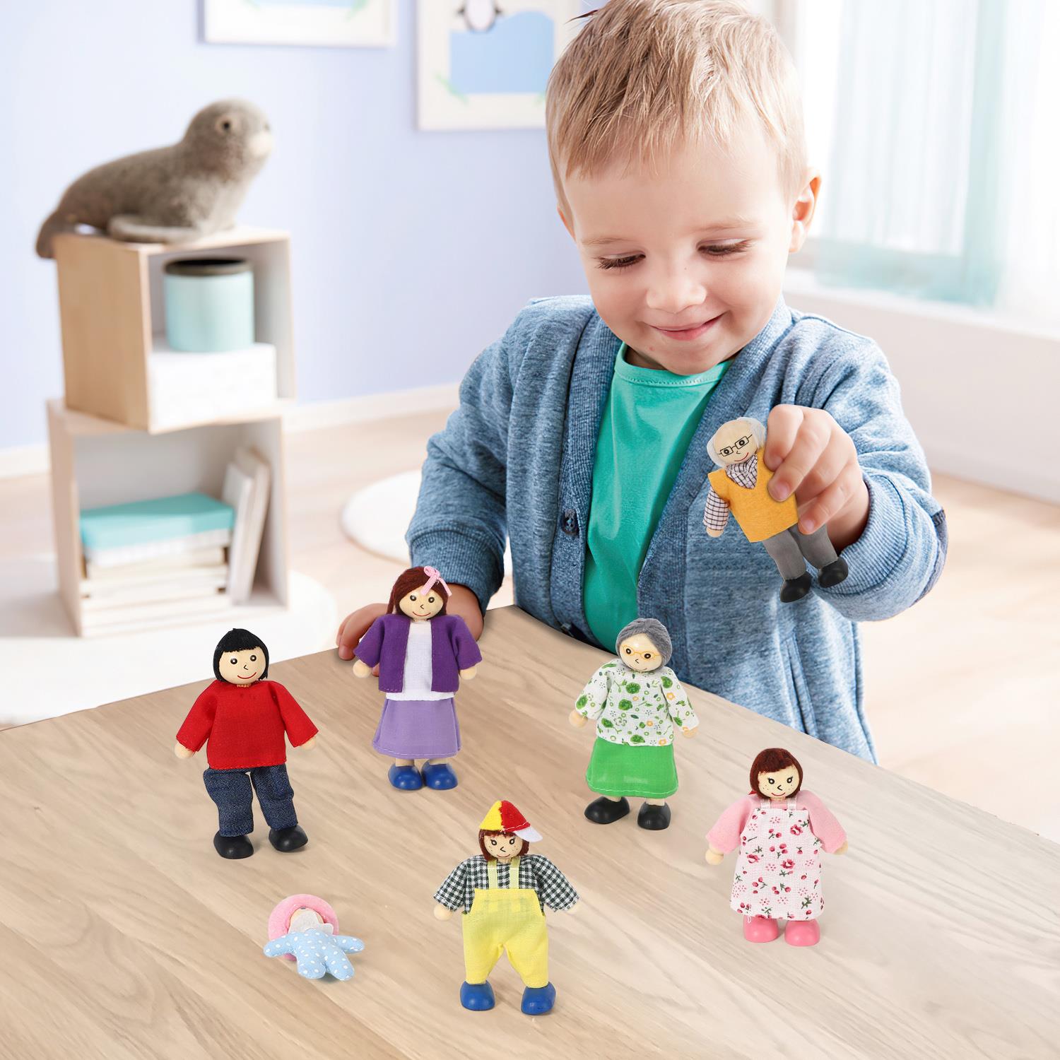 Wooden Happy Family Doll Set with flexible arms, featuring 7 colorful dolls from SOKA Play Imagine Learn.