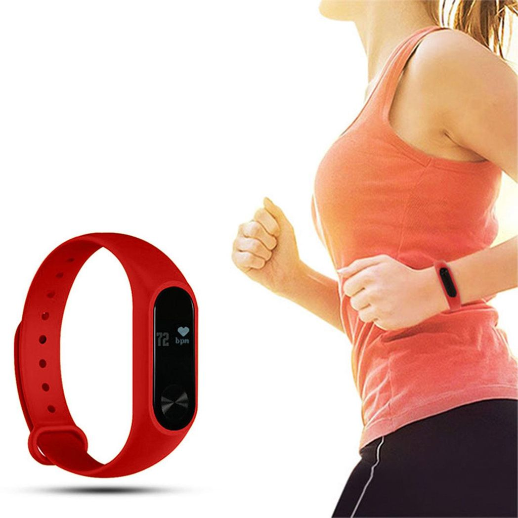 Red Aquarius AQ112 fitness tracker with heart rate monitor displayed on a wrist, featuring a sleek design and digital screen.