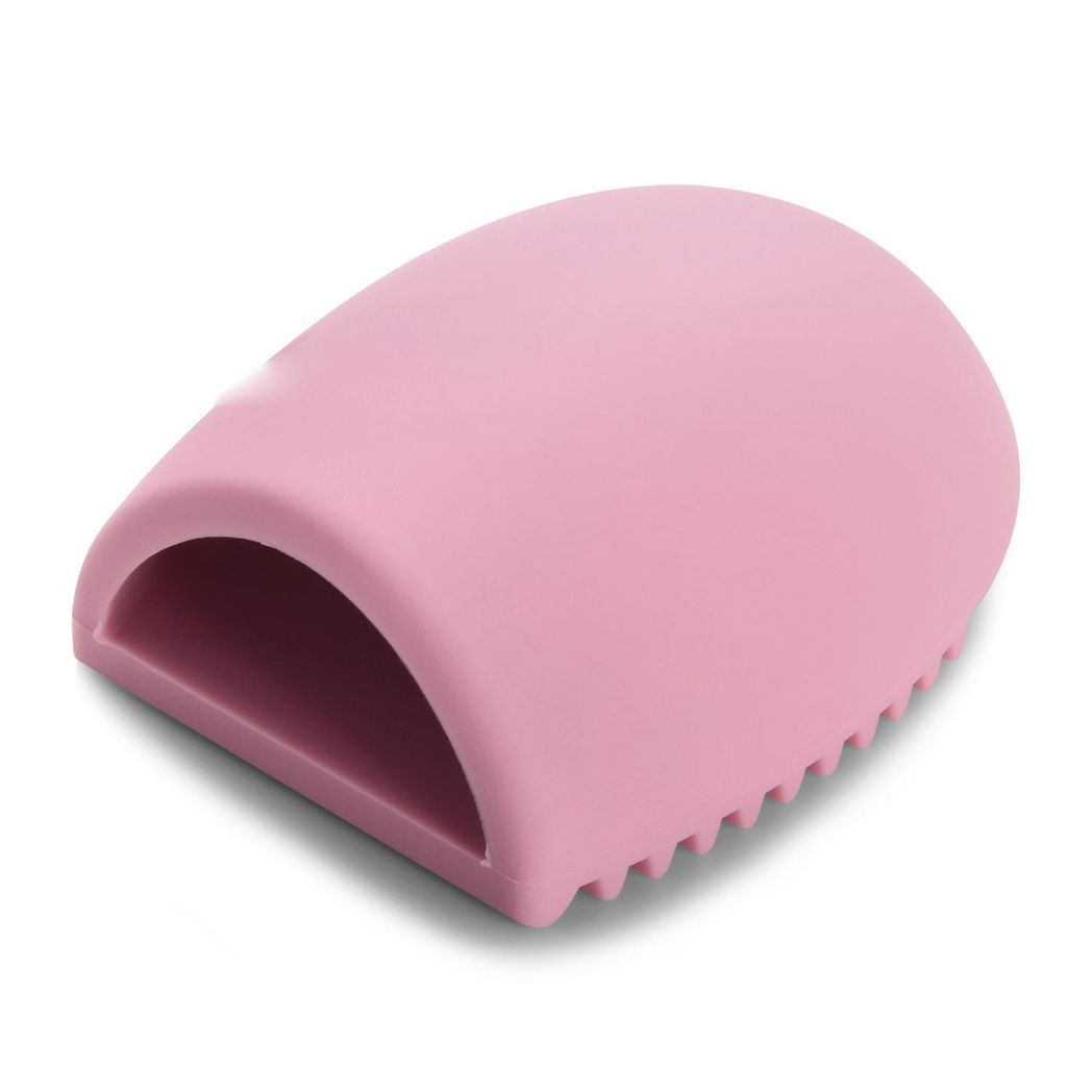 Pink and purple Silicone Egg Sponge Scrubber by GlowCare for cleaning make-up brushes, featuring a textured surface.
