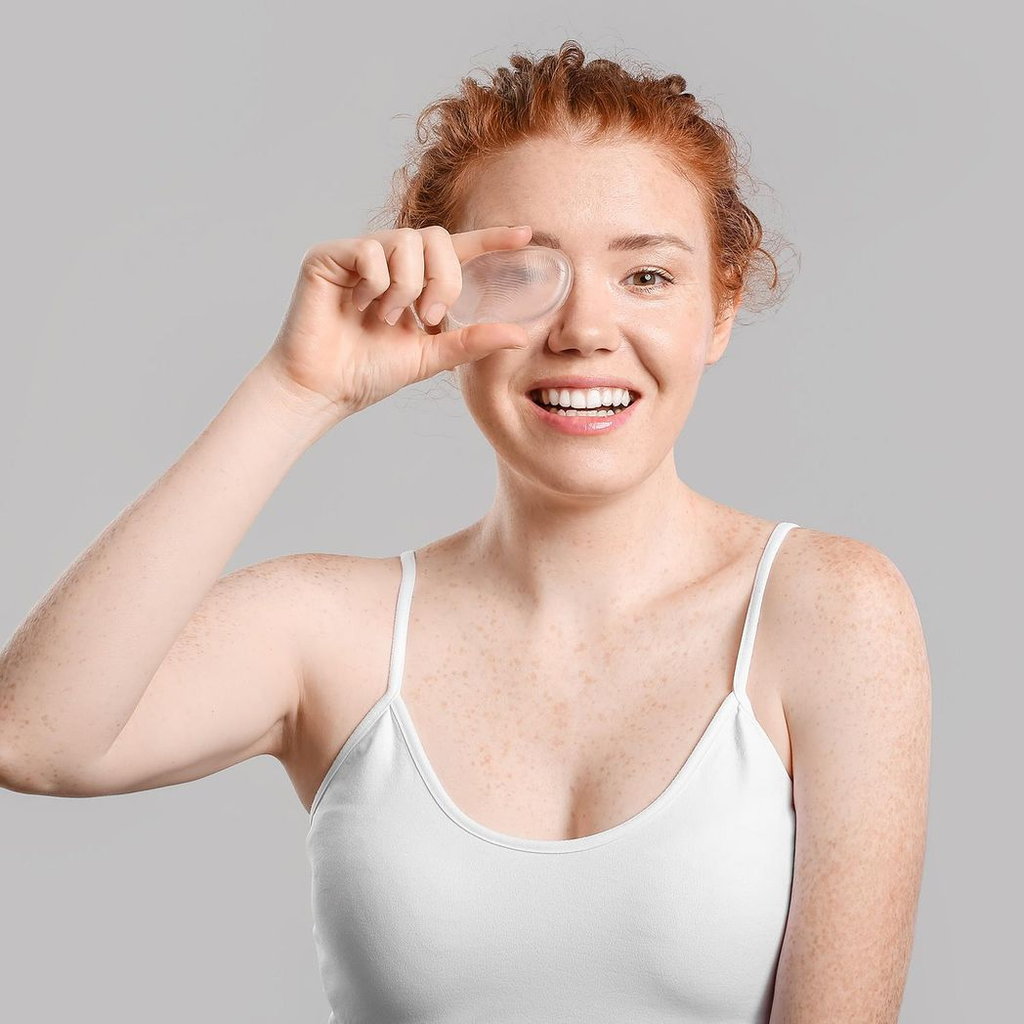 Clear silicone make-up sponge from GlowCare, featuring a smooth, flexible design ideal for seamless foundation application.