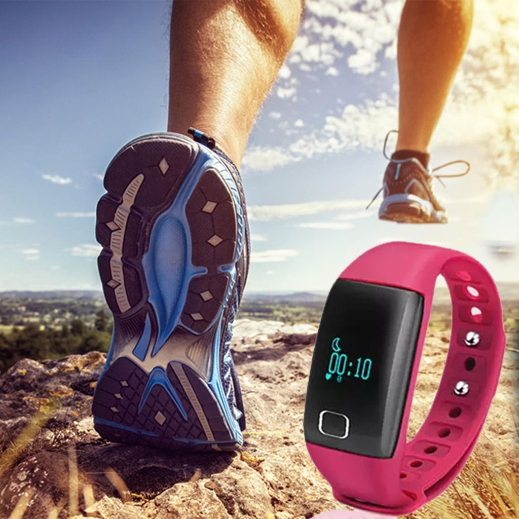 Pink T1 Waterproof Fitness Tracker by Bas-Tek displaying heart rate monitor and fitness stats on a digital screen.