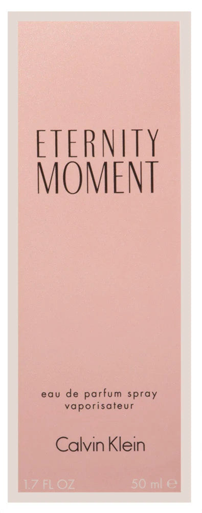 Calvin Klein Eternity Moment Eau De Parfum Spray 50ml in a sleek bottle with floral accents on a soft background.