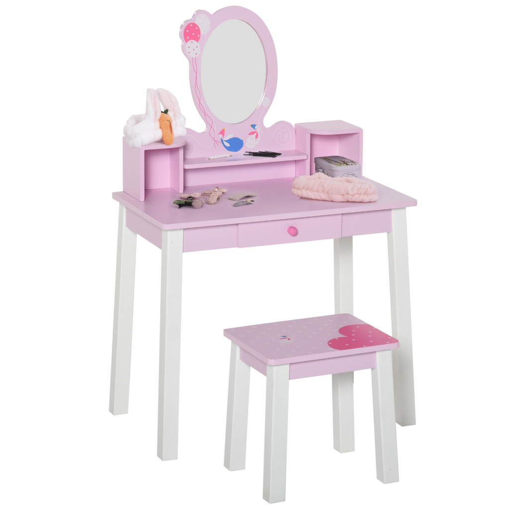 Kids dressing table and stool set in pink with cartoon patterns, featuring a mirror and storage compartments.